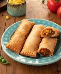 Pizza Puff available at Rk Iconic through DeskDrop
