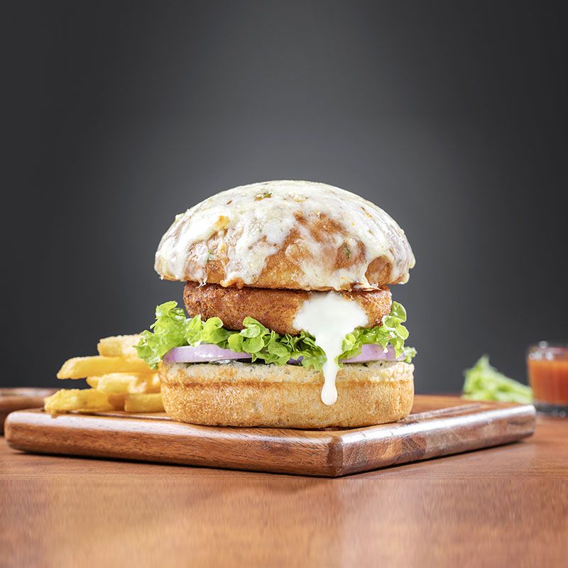 Crazy Cheesy Burger (Cheese tikki) available at Krish Cubical through DeskDrop