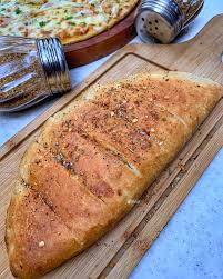 Makhni Garlic Bread available at Aakruti BizHub through DeskDrop