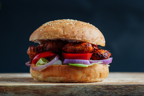 Tandoori Tadka Burger available at Krish Cubical through DeskDrop