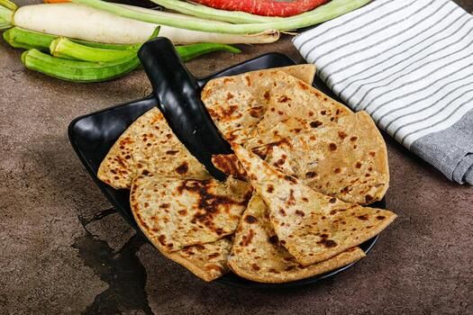 Aloo Paratha - 1 Pc. available at Apm mall through DeskDrop