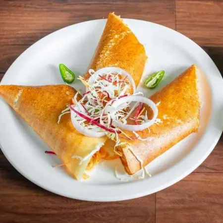Cheese Chilli Dosa available at Rk Prime through DeskDrop