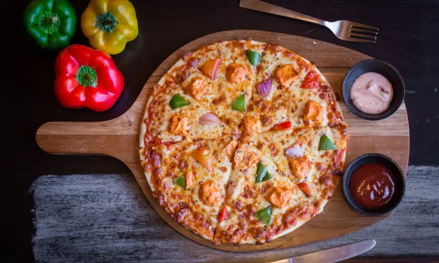 Tandoori Pizza available at Rk Prime through DeskDrop